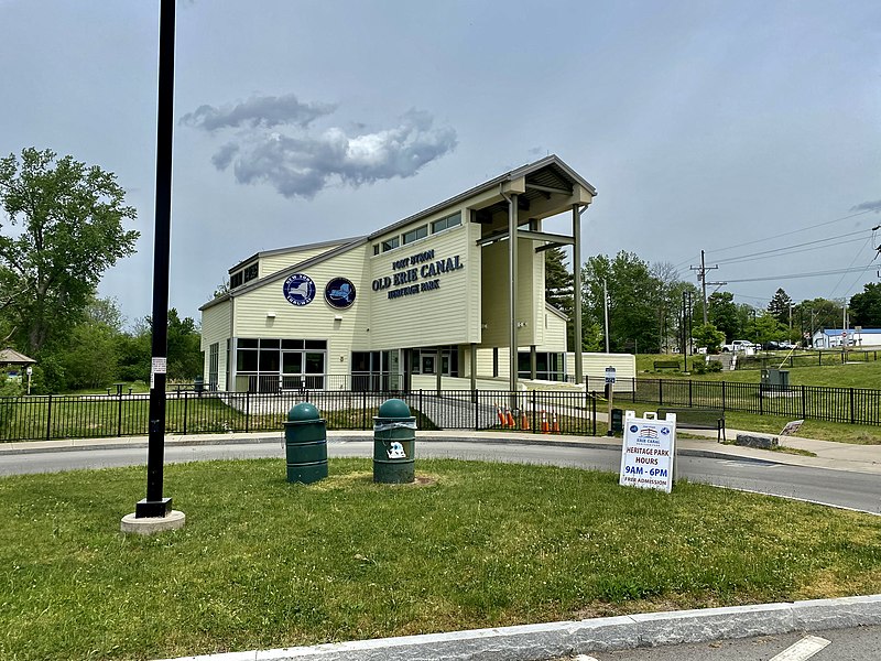 Exterior view of the Port Byron Old Erie Canal Heritage Park building on a cloudy day.