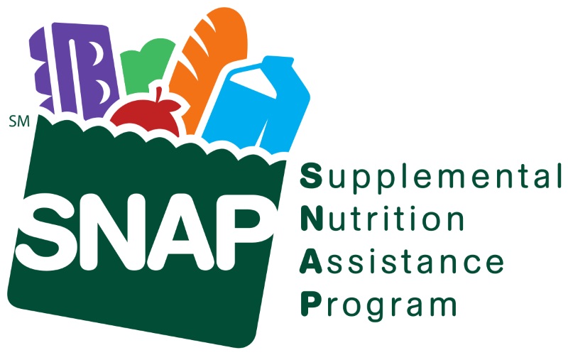 Logo for the Supplemental Nutrition Assistance Program (SNAP) featuring a green shopping bag filled with groceries.