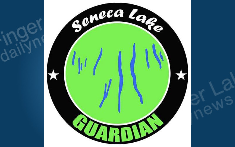 Logo for Seneca Lake Guardian: a green circle with blue waterways, encircled by 'Seneca Lake GUARDIAN' in a black ring with stars.
