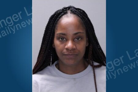 Mugshot of Chuncey Ward, a woman with braided hair, looking directly at the camera.