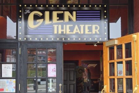 The Glen Theater entrance with its classic marquee sign and red brick facade.