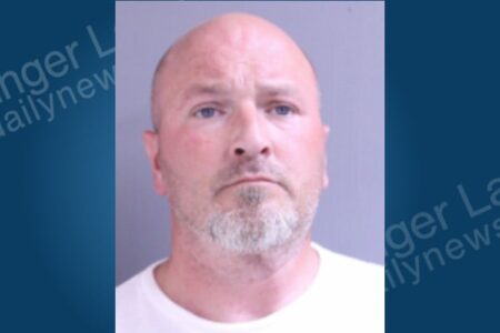 Mugshot of Jason Skyner, a bald man with a gray beard, looking forward.