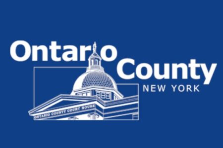Ontario County New York logo with an illustration of the Ontario County Court House on a blue background.