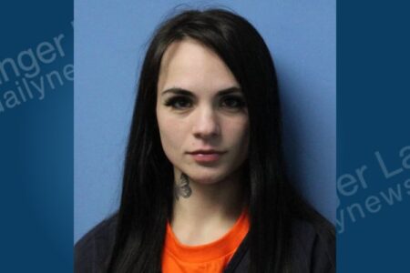 Mugshot of Sarah Cripps, a woman with long dark hair, arrested for violating an order of protection.