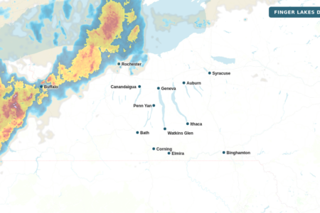 Weather radar map showing a band of storms over western and central New York, including the Finger Lakes region.