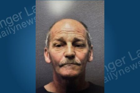 Mugshot of David Hively, a man with a mustache and receding hairline, arrested for alleged hammer assault.