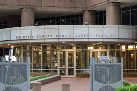 Exterior view of the Hennepin County Public Safety Facility building entrance.